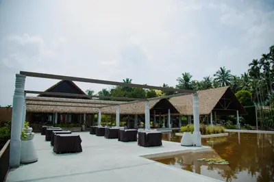a wedding reception at a resort with tables and chairs at Maayaa riverside villa by KPM Tripenta in Attappādi