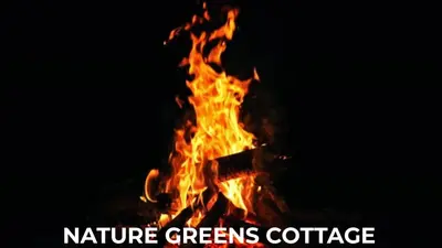 a fire with the words nature greens coffee on it at Nature Greens Cottage in Madikeri