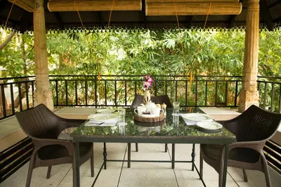 a table with a cake on top of it at Akshaya Bungalow by Sparsa in Sethumadai