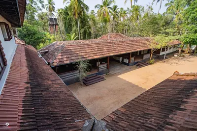 an overhead view of a house with a roof at Meleppura Heritage Homestay in Chāvakkād