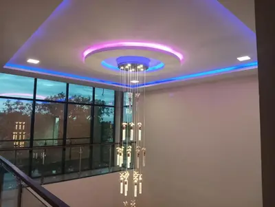 a ceiling with a purple light in a building at ANTARA STAY in Coimbatore