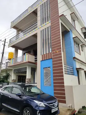 a car parked in front of a house at 