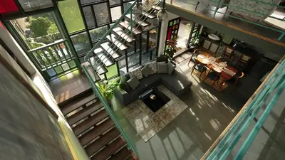 an overhead view of a living room and dining room at Lofterra in Kozhikode