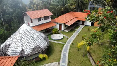 a model of a house with a garden at JK Nature Stay Resorts in Kanthalloor