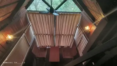 an overhead view of a room with a ceiling fan at Tree House Wayanad in Muthanga