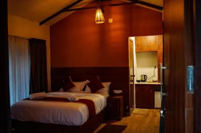 a bedroom with a bed and a sink in it at Coffee Cradle Wayanad Luxuorios Private Tree House - Inside 2 Acre Coffee Plantation in Mananthavady