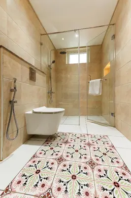 a bathroom with a tub and a sink and a shower at Clouds Nest By Aanvis Inn in Ooty