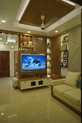 a living room with a large flat screen tv at Luxury Homes - Cochin Airport - Nedumbassery in Angamali