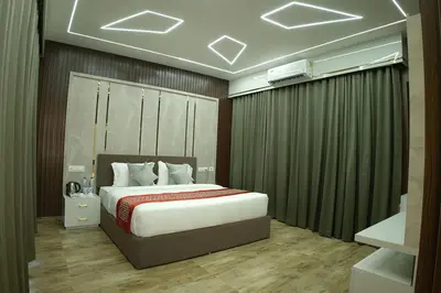 a bedroom with a bed in a room with avertisement at Mystery Maze Resort and Spa in Wayanad