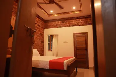 a bedroom with a bed and a ceiling at Best Heritage Home in Iritti