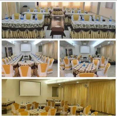 three pictures of a conference room with tables and chairs at Hotel Sapthagiri Nest in Coimbatore