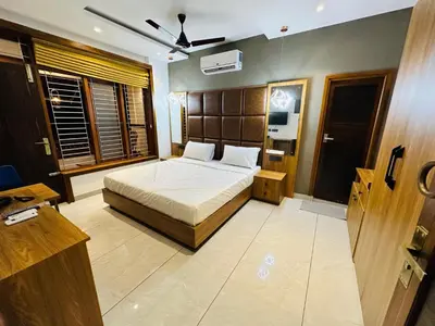 a bedroom with a bed in a room at Farm Fort Resort in Kozhikode