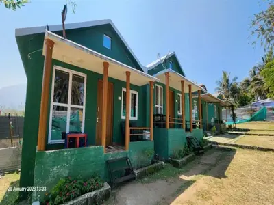 a green house with a green at The Wild Farms By Gwestai in Masinagudi