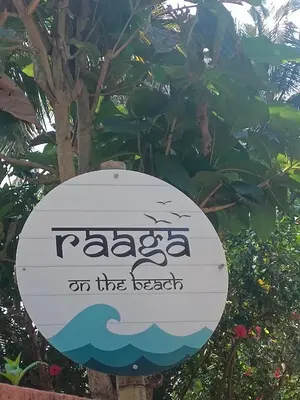 a sign that reads race on the beach at Raaga on the Beach in Kannur