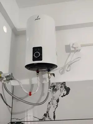 a camera in a room with a dog on the wall at Spacious 2BHK Near Airport in Cochin