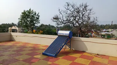 a blue object sitting on top of a roof at SHI's Velliangiri 3BHK Individual villa Near Isha Adiyogi, Coimbatore in Alāndurai