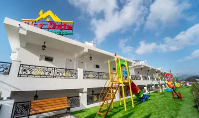 a playground on the side of a building at Treebo Skydale Premium Suites, 1500 Mtrs From Ooty Lake in Ooty