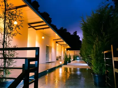 an external view of a house at night at Ooty Boulevard in Ooty