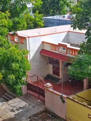 an overhead view of a building with a balcony at Shivalaya Stays - Coimbatore in Coimbatore