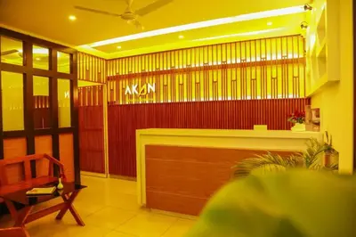 a lobby with a kaya sign on the wall at AKAN HOTEL AND RESIDENCE in Wayanad