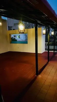 an empty room with a pool in a building at Bhoomiputra Mansion in Mysore