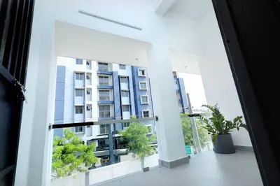 a view of a building from a window at Eazy Homes in Palakkad