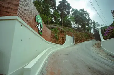 a skateboard on the side of a wall on a road at Nila Paithal in Paithalmala