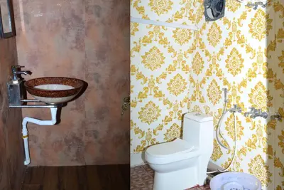 a bathroom with a sink and a toilet at Kodaikanal Luxuries Glamp - Krishna Paradize in Kūkkāl