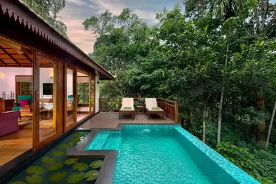 a pool on the deck of a house at Pepper Trail in Sultan Bathery