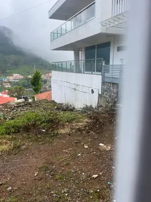 a house on top of a hill with at Hill Resort 3 in Ooty