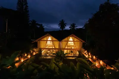 a lit up greenhouse with lights at night at Tool House - Great Estate Stay for Remote Work in Siddapur