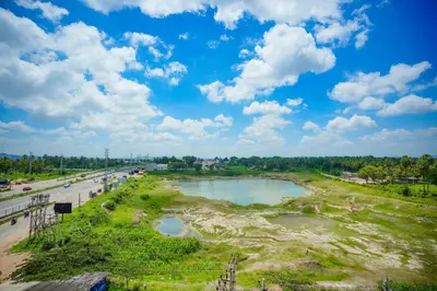 a view of a river from a bridge at My Rooms Channapatna in Channapatna