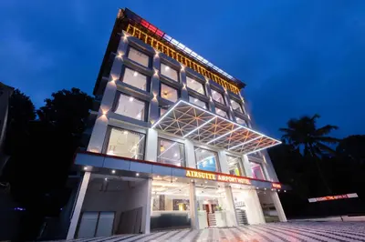a building with lights on top of it at night at Treebo Airsuite Airport Hotel in Cochin