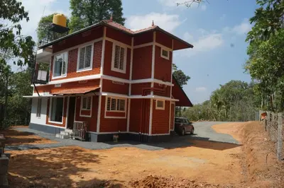 a house under construction in the countryside at Vihaara Wayanad Serviced Villa in Ambalavayal