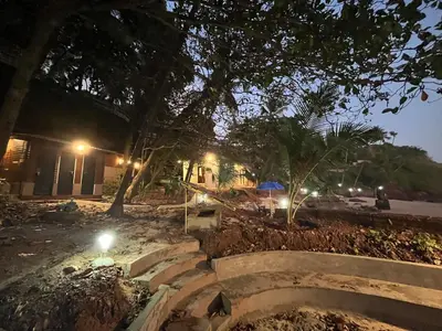 a view of a building at night at Rocks beach house in Kannur