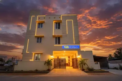 a building with a sign in front of it at Via Aarudra s Residency in Coimbatore