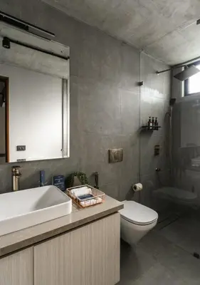 a bathroom with a sink and a toilet and a tub at LohonoStays Amani Villa 10A in Coonoor