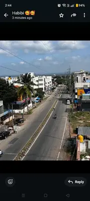 a view of a city street with a street at SAHAR HOMEstay 02 in Mysore