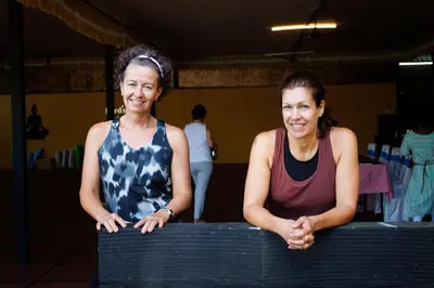 two women standing next to each other at Birds Island Ayur-Yoga Retreat in Ernakulam