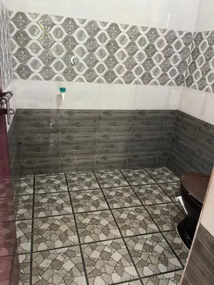 a bathroom with a shower with a toilet at Scott legacy apartment in Kulattūr