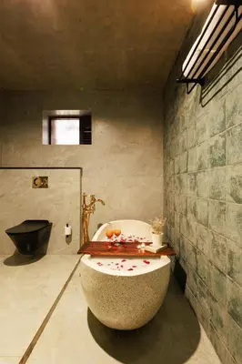 a bathroom with a large tub in a room at Jungle Park Resort-Rain Forest Experience by GreenEscapes in Vythiri