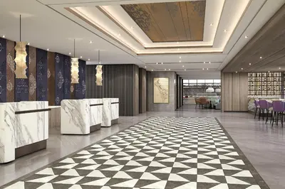 a lobby with a checkered floor at Taj Cochin International Airport, Kerala in Cochin