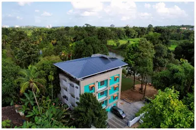 an overhead view of a building with a solar roof at Vajra Periyar Heritage in Alwaye
