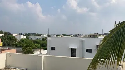 a view from the roof of a white building at NJM Villa in Coimbatore
