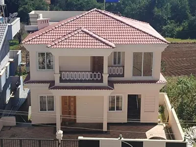 an overhead view of a house with a tile roof at Dwarka Home Stay in Ooty