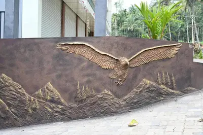 a painting of an eagle on the side of a wall at Hotel Aamis Villa in Pulpally