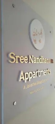 a sign on a wall that reads street nautical augmentments at Sree Nandhanam Apartment's in Guruvāyūr