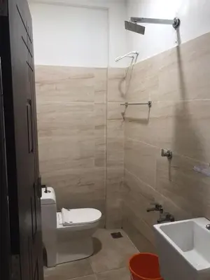 a bathroom with a toilet and a sink at low budget room at Kalpetta in Kalpetta
