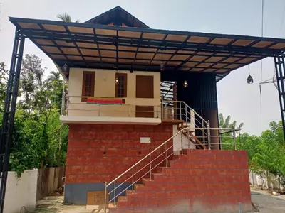 a house being constructed with a roof at Private Cottage Wayanad in Kalpetta