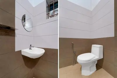 two pictures of a bathroom with a toilet and a sink at Townhouse Thondayad Calicut Formerly Dream Casa in Kakkayam